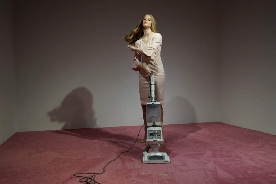 Art exhibit shows Ivanka Trump lookalike vacuuming up crumbs
