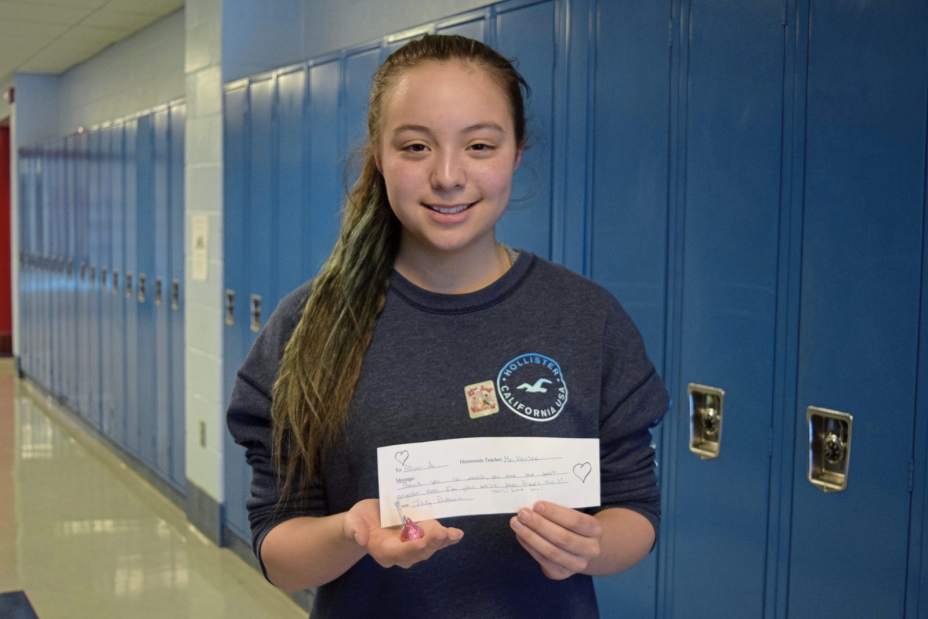Shaler Area Middle School student purchases candygrams for the entire school